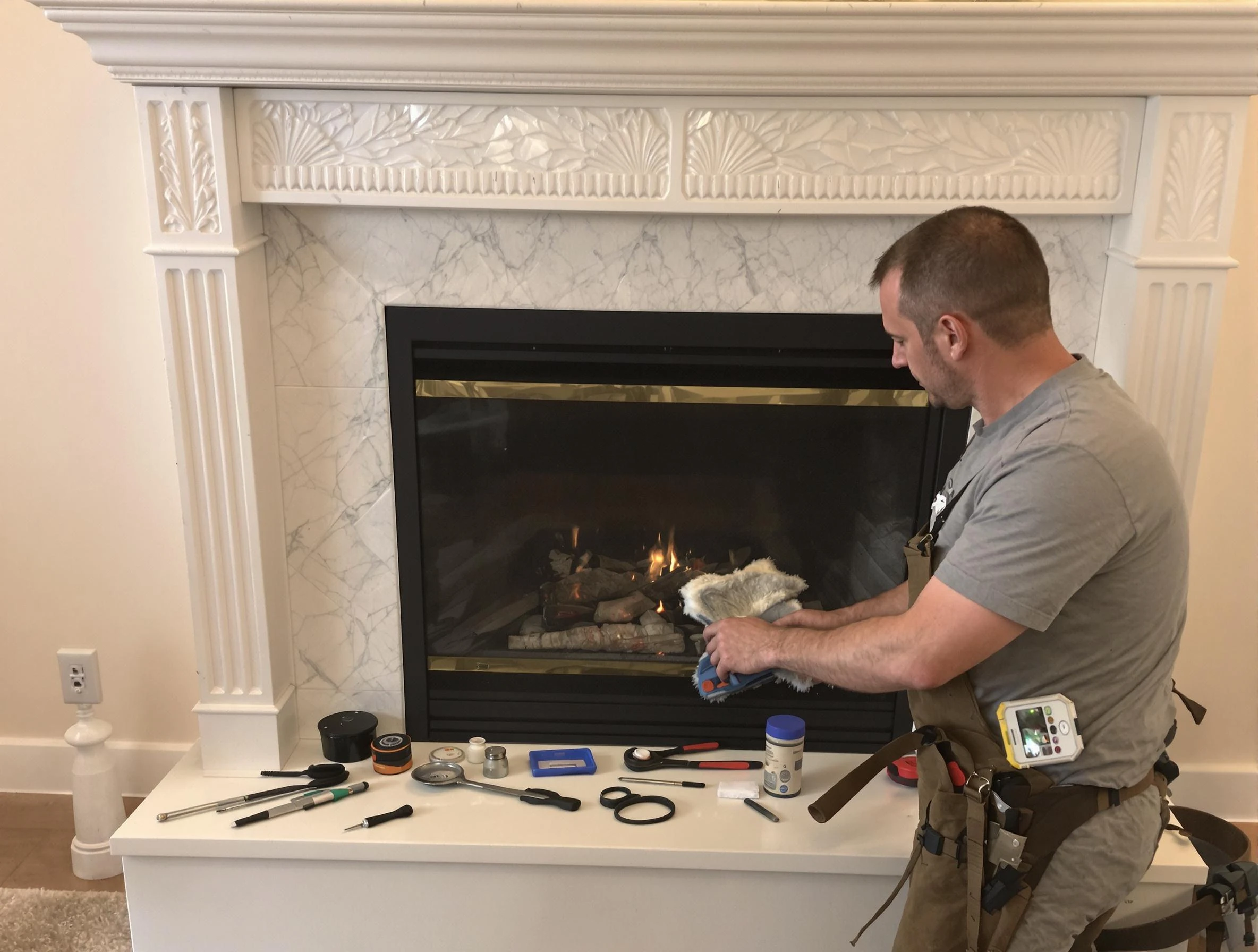 Chelsea Chimney Sweep performing fireplace maintenance in Chelsea, MA